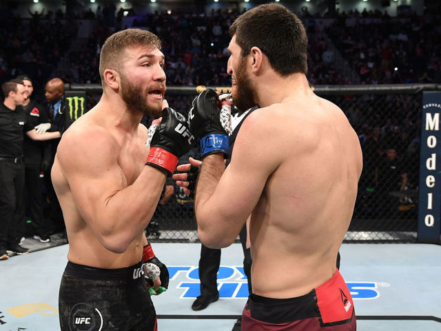 NORFOLK, VA - FEBRUARY 29: (L-R) Ion Cutelaba and Magomed Ankalaev exchange words after their light heavyweight bout during the UFC Fight Night event at Chartway Arena on February 29, 2020 in Norfolk, Virginia.