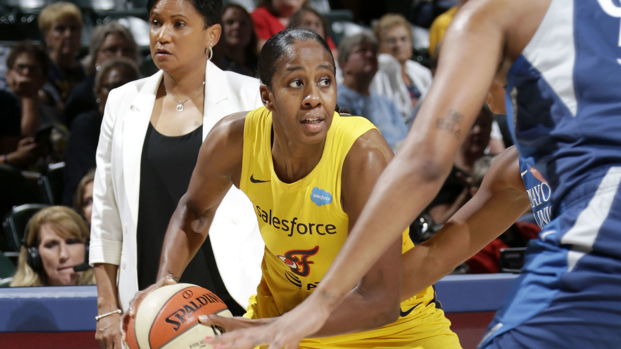 INDIANAPOLIS, IN - AUGUST 3: Shenise Johnson #42 of the Indiana Fever handles the ball against the Minnesota Lynx on August 3, 2019 at the Bankers Life Fieldhouse in Indianapolis, Indiana. Mandatory Copyright Notice: Copyright 2019 NBAE