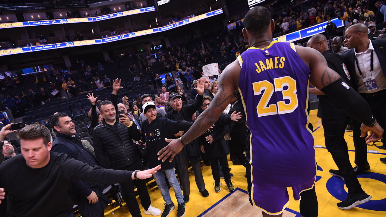 SAN FRANCISCO, CA - FEBRUARY 8: LeBron James #23 of the Los Angeles Lakers high fives fans after the game against the Golden State warriors on February 8, 2020 at Chase Center in San Francisco, California. NOTE TO USER: User expressly acknowledges and agrees that, by downloading and or using this photograph, user is consenting to the terms and conditions of Getty Images License Agreement. Mandatory Copyright Notice: Copyright 2020 NBAE