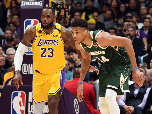 LOS ANGELES, CA - MARCH 6: LeBron James #23 of the Los Angeles Lakers plays defense against Giannis Antetokounmpo #34 of the Milwaukee Bucks on March 6, 2020 at STAPLES Center in Los Angeles, California. NOTE TO USER: User expressly acknowledges and agrees that, by downloading and/or using this Photograph, user is consenting to the terms and conditions of the Getty Images License Agreement. Mandatory Copyright Notice: Copyright 2020 NBAE