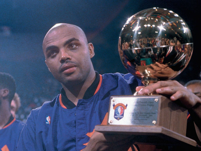 MUNICH, GERMANY - OCTOBER 23: Charles Barkley #34 of the Phoenix Suns poses with his MVP trophy during the 1993 McDonald's Open played October 23, 1993 at the Olympiahalle in Munich, Germany. NOTE TO USER: User expressly acknowledges that, by downloading and or using this photograph, User is consenting to the terms and conditions of the Getty Images License agreement. Mandatory Copyright Notice: Copyright 1993 NBAE