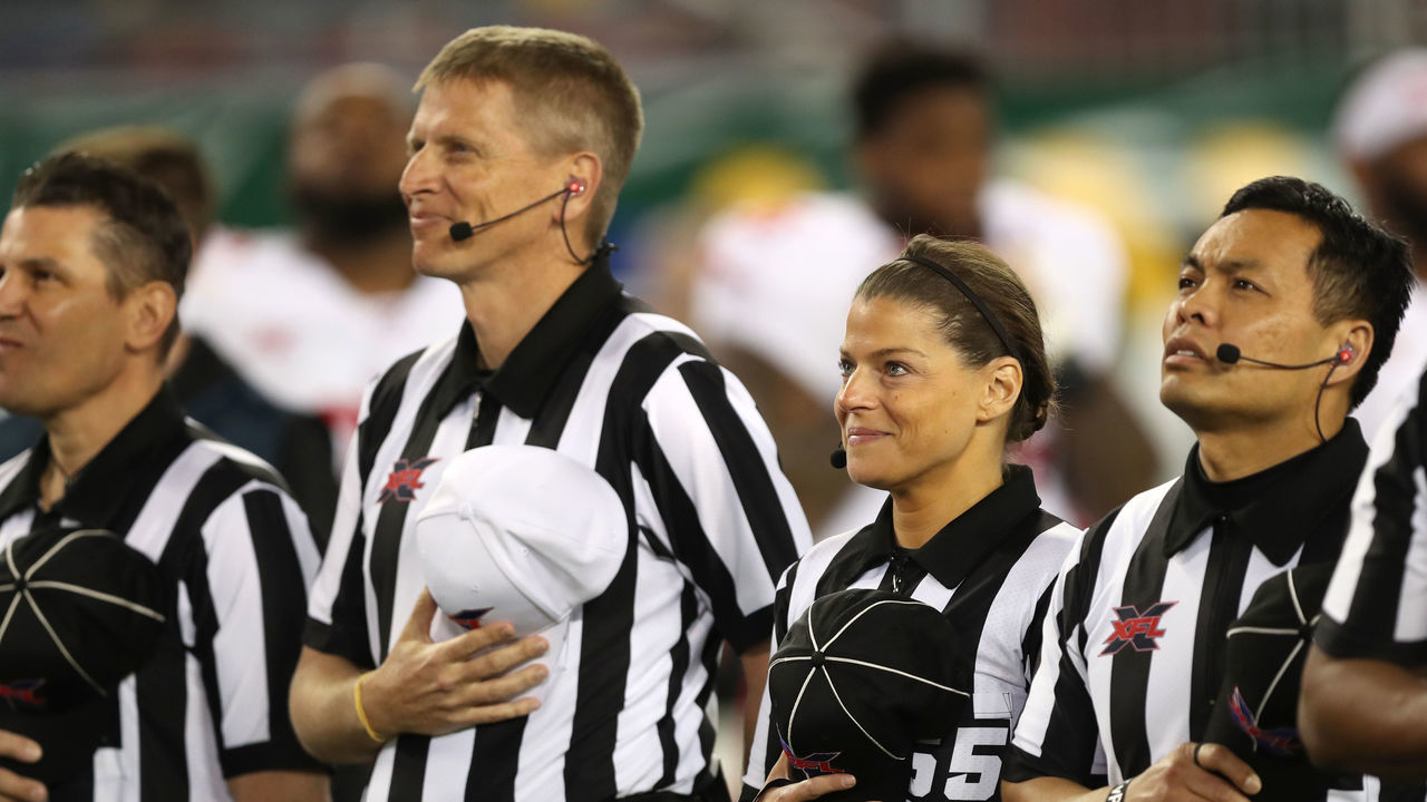 TAMPA, FL - MARCH 1: Referees stand for the National Anthem before the XFL game between the DC Defenders and the Tampa Bay Vipers at Raymond James Stadium on March 1, 2020 in Tampa, Florida.