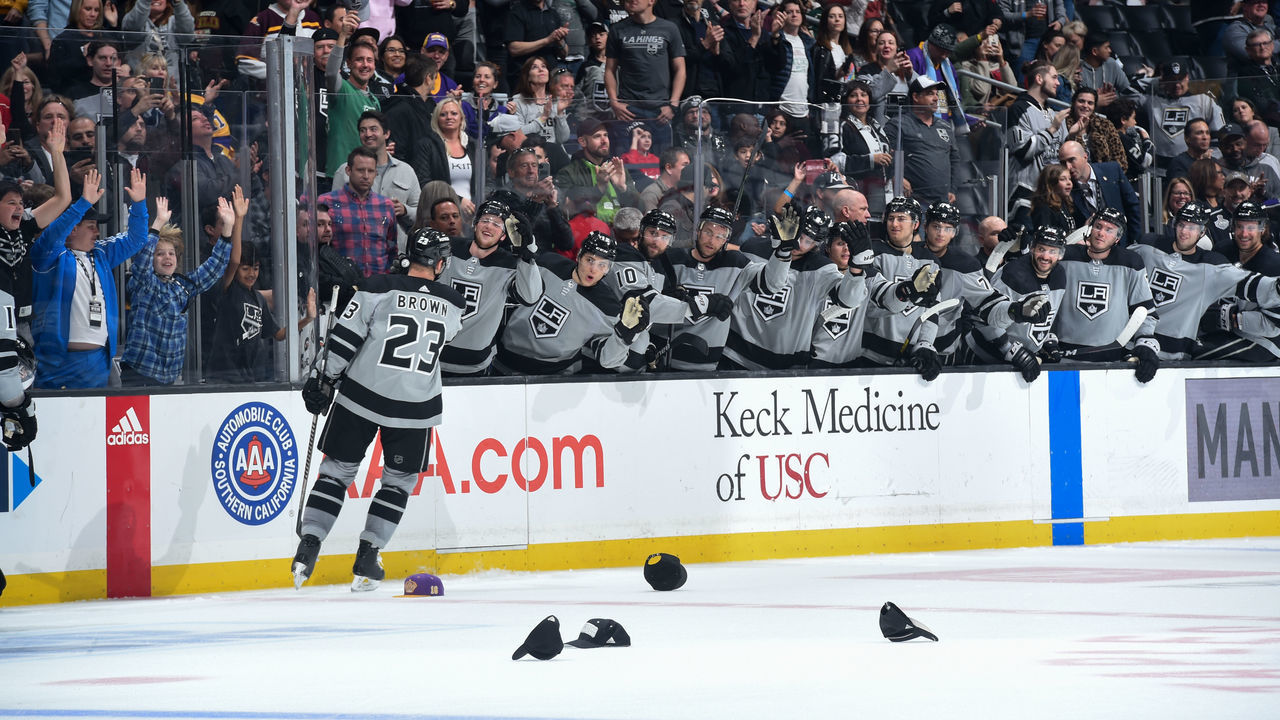 LOS ANGELES, CA - MARCH 7: Dustin Brown #23 of the Los Angeles Kings celebrates his hat trick goal with teammates during the third period against the Minnesota Wild at STAPLES Center on March 7, 2020 in Los Angeles, California.