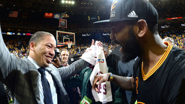 OAKLAND, CA - JUNE 19: Head coach Tyronn Lue celebrates with Kyrie Irving #2 of the Cleveland Cavaliers after winning Game Seven of the 2016 NBA Finals against the Golden State Warriors on June 19, 2016 at ORACLE Arena in Oakland, California. Mandatory Copyright Notice: Copyright 2016 NBAE
