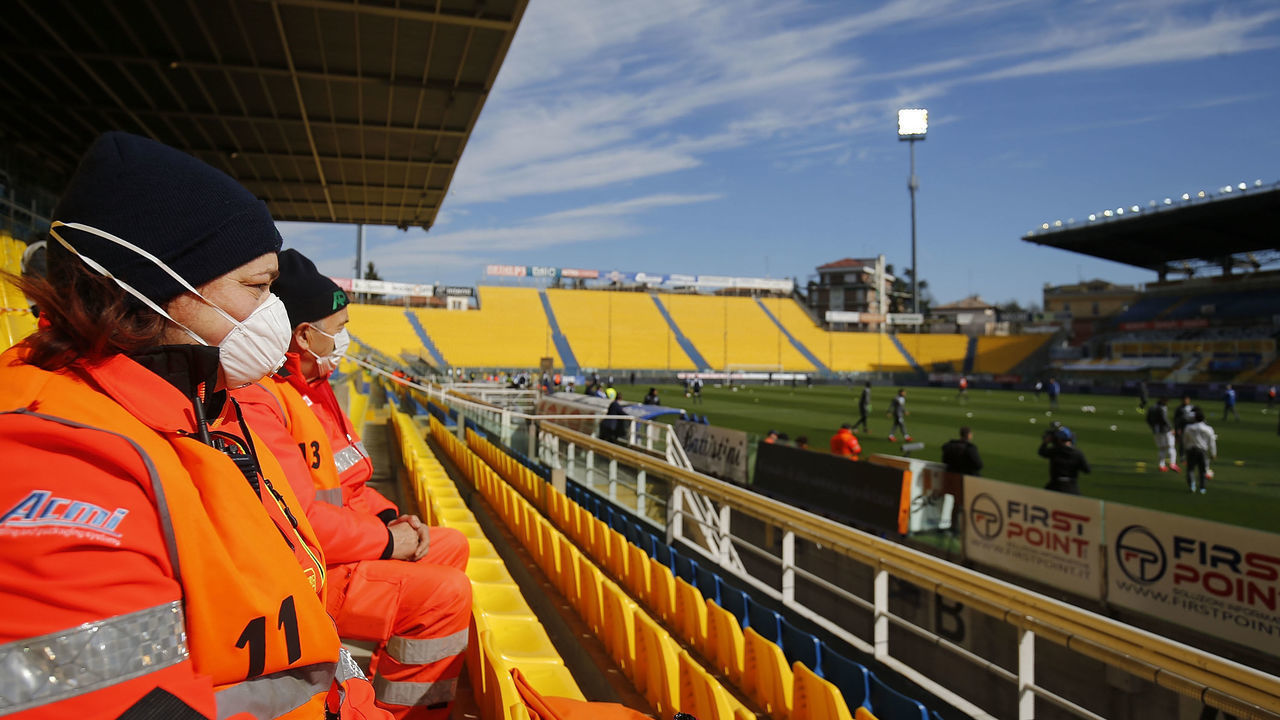 PARMA, ITALY - MARCH 08: A man with a protective mask during the Serie A match between Parma Calcio and SPAL at Stadio Ennio Tardini on March 1, 2020 in Parma, Italy.