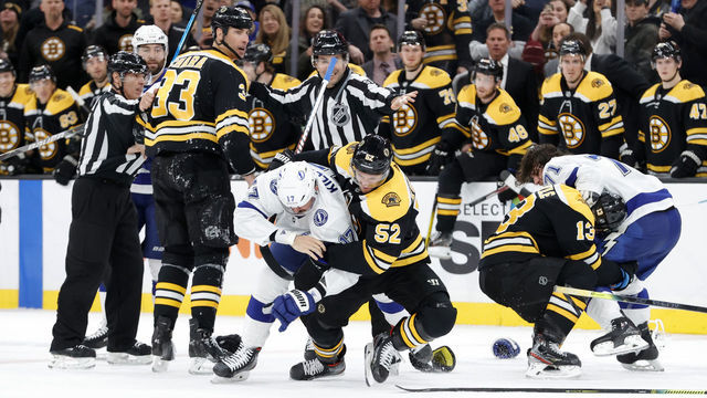 BOSTON, MA - MARCH 07: Boston Bruins center Sean Kuraly (52) wrestles Tampa Bay Lightning right wing Alex Killorn (17) during a game between the Boston Bruins and the Tampa Bay Lightning on March 7, 2020 at TD Garden in Boston,. Massachusetts.