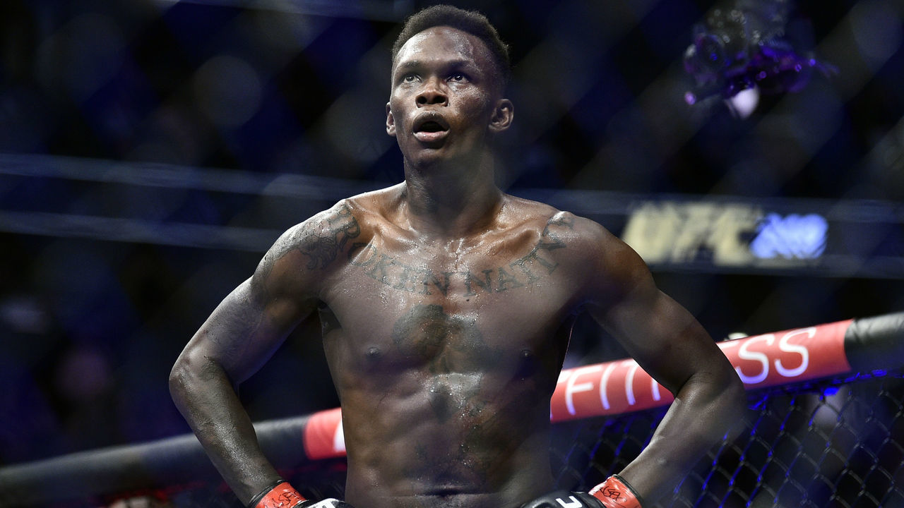 LAS VEGAS, NEVADA - MARCH 07: Israel Adesanya of Nigeria reacts after the conclusion of his UFC middleweight championship fight against Yoel Romero of Cuba during the UFC 248 event at T-Mobile Arena on March 07, 2020 in Las Vegas, Nevada.