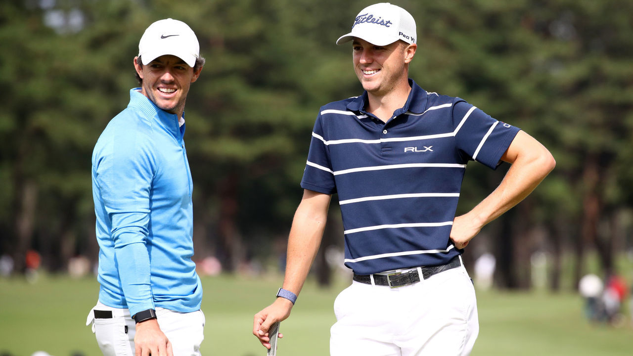 INZAI, JAPAN - OCTOBER 24: Justin Thomas (R) of the United States and Rory McIlroy of Northern Ireland (L) of the Northern Ireland talk on the 9th green during the first round of the ZOZO Championship at Accordia Golf Narashino Country Club on October 24, 2019 in Inzai, Chiba, Japan.
