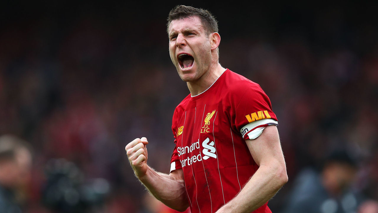 LIVERPOOL, ENGLAND - MARCH 07: James Milner of Liverpool celebrates at full time during the Premier League match between Liverpool FC and AFC Bournemouth at Anfield on March 7, 2020 in Liverpool, United Kingdom.