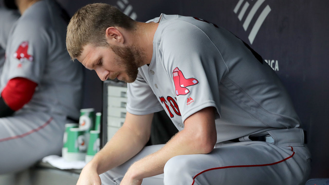 NEW YORK, NEW YORK - AUGUST 03: Chris Sale #41 of the Boston Red Sox sits in the dugout in the second inning as his team bats against the New York Yankees during game one of a double header at Yankee Stadium on August 03, 2019 in the Bronx borough of New York City.