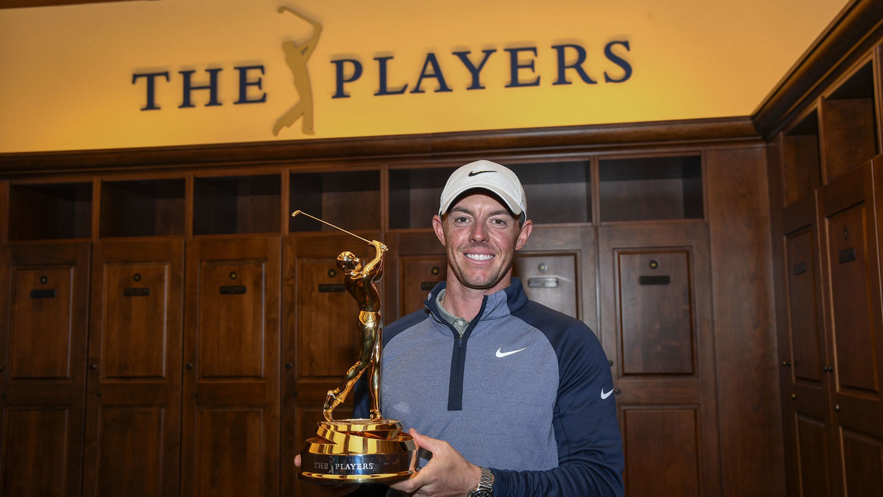 PONTE VEDRA BEACH, FL - MARCH 17: Rory McIlroy of Northern Ireland with THE PLAYERS Championship trophy in the Champions locker room after the final round of THE PLAYERS Championship on THE PLAYERS Stadium Course at TPC Sawgrass on March 17, 2019, in Ponte Vedra Beach .