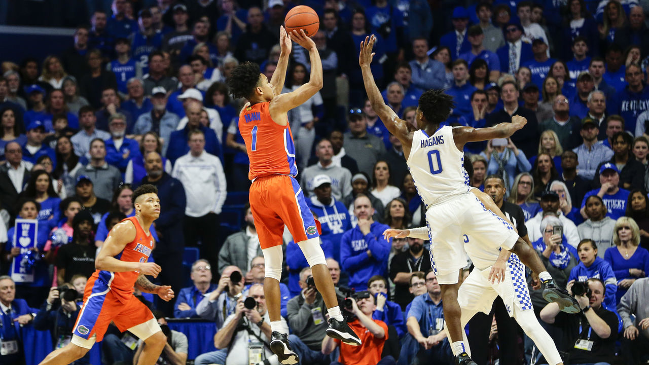 LEXINGTON, KENTUCKY - FEBRUARY 22: Tre Mann #1 of the Florida Gators takes a shot while guarded by Ashton Hagans #0 of the Kentucky Wildcats at Rupp Arena on February 22, 2020 in Lexington, Kentucky.