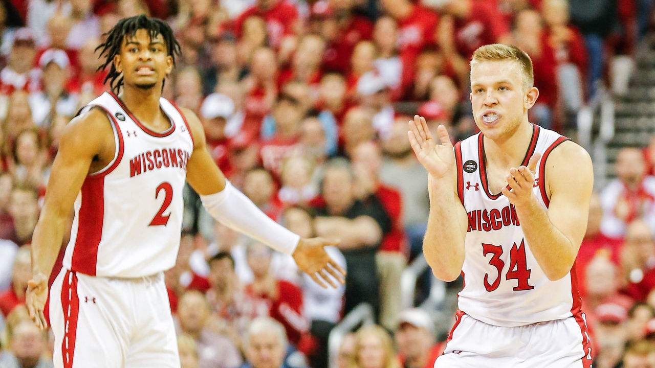 MADISON, WI - MARCH 01: Wisconsin guard Brad Davison (34) tries to get the fans fired up during a college basketball game between the University of Wisconsin Badgers and the University of Minnesota Golden Gophers on March 1, 2020 at the Kohl Center in Madison, WI.