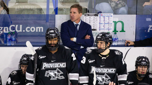 LOWELL, MA - DECEMBER 7: Nate Leaman coach of the Providence College Friars stands behind the bench during a game against the Massachusetts Lowell River Hawks during NCAA men's hockey at the Tsongas Center on December 7, 2019 in Lowell, Massachusetts. The Friars won 4-1.