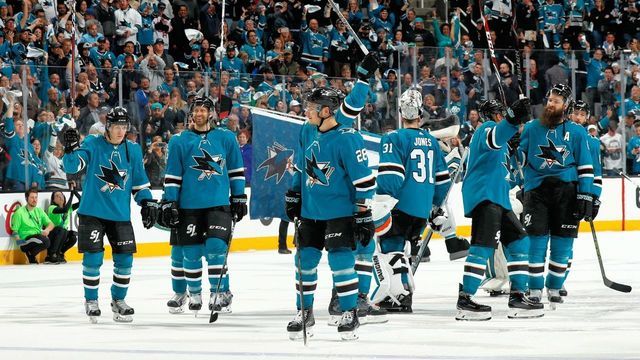 SAN JOSE, CA - APRIL 18: The San Jose Sharks salute the crowd after winning in Game Four of the Western Conference First Round against the Anaheim Ducks during the 2018 NHL Stanley Cup Playoffs at SAP Center on April 18, 2018 in San Jose, California. The Sharks defeated the Ducks 2-1.