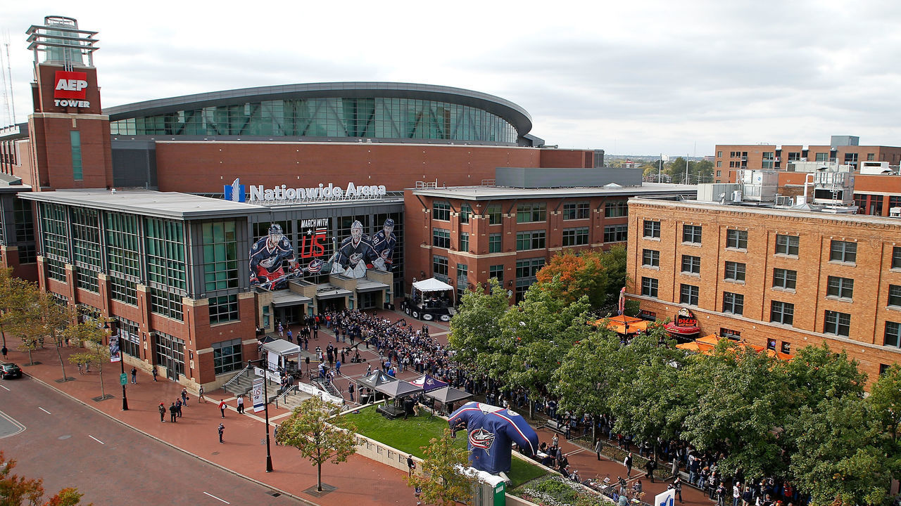 COLUMBUS, OH - OCTOBER 9: Fans line up outside of Nationwide Arena as members of the Columbus Blue Jackets walk down a blue carpet prior to the start of the opening night game against the New York Rangers on October 9, 2015 at Nationwide Arena in Columbus, Ohio.