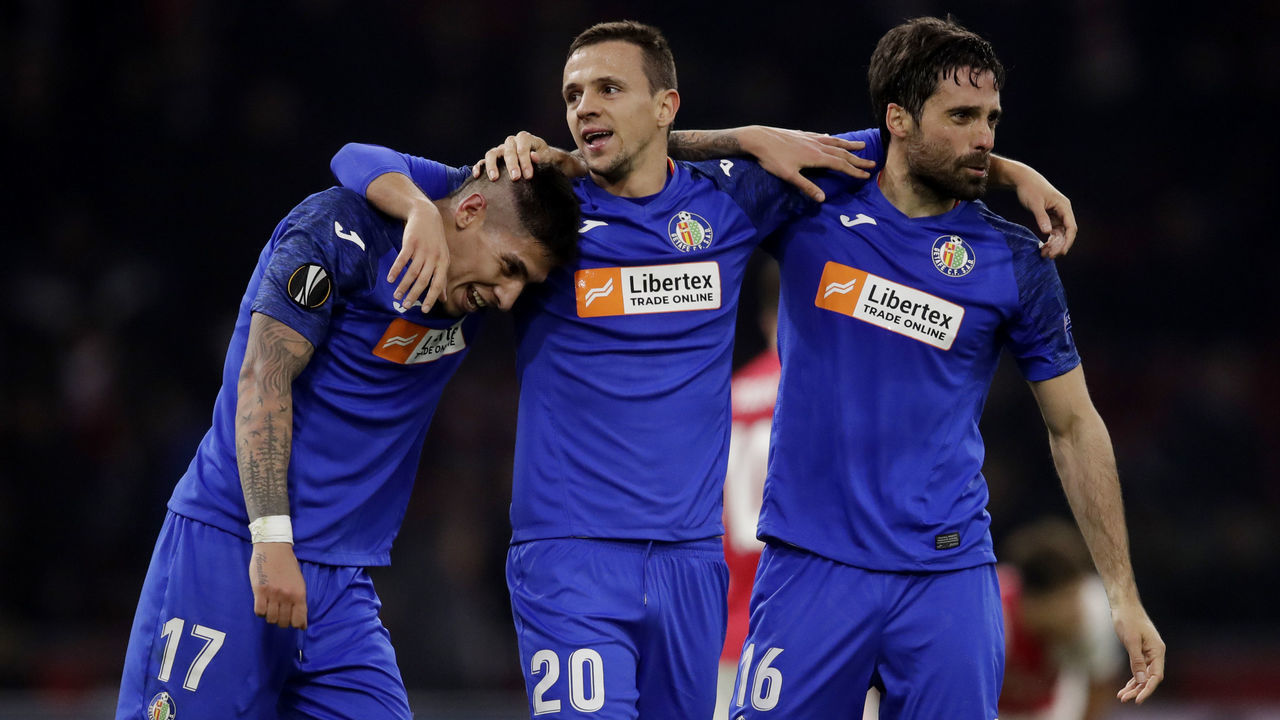AMSTERDAM, NETHERLANDS - FEBRUARY 27: (L-R) Mathias Olivera of Getafe, Nemanja Maksimovic of Getafe, Xabier Etxeitia of Getafe celebrates the victory during the UEFA Europa League match between Ajax v Getafe at the Johan Cruijff Arena on February 27, 2020 in Amsterdam Netherlands