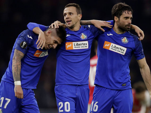 AMSTERDAM, NETHERLANDS - FEBRUARY 27: (L-R) Mathias Olivera of Getafe, Nemanja Maksimovic of Getafe, Xabier Etxeitia of Getafe celebrates the victory during the UEFA Europa League match between Ajax v Getafe at the Johan Cruijff Arena on February 27, 2020 in Amsterdam Netherlands