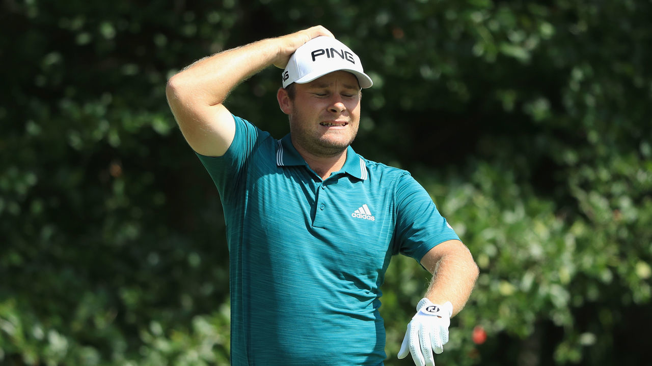 NORTON, MA - SEPTEMBER 02: Tyrrell Hatton of England reacts to his shot from the fourth tee during round three of the Dell Technologies Championship at TPC Boston on September 2, 2018 in Norton, Massachusetts.