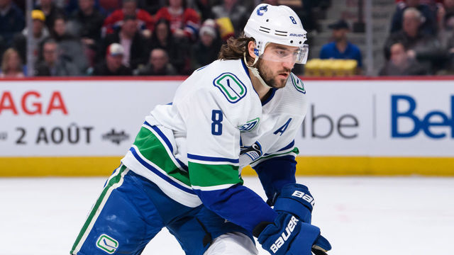 MONTREAL, QC - FEBRUARY 25: Christopher Tanev (8) of the Vancouver Canucks skates during the first period period of the NHL game between the Vancouver Canucks and the Montreal Canadiens on February 25, 2020, at the Bell Centre in Montreal, QC