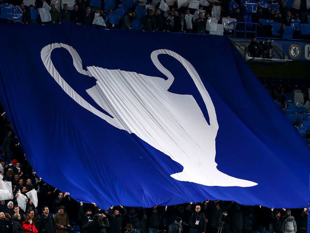 LONDON, ENGLAND - FEBRUARY 25: Fans of Chelsea hold up a tifo display with a giant UEFA Champions League trophy on during the UEFA Champions League round of 16 first leg match between Chelsea FC and FC Bayern Muenchen at Stamford Bridge on February 25, 2020 in London, United Kingdom.