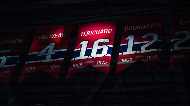 MONTREAL, QC - MARCH 10: The banner of Henri Richard is lighten during a moment of silence during the first period of the NHL game between the Nashville Predators and the Montreal Canadiens on March 10, 2020, at the Bell Centre in Montreal, QC