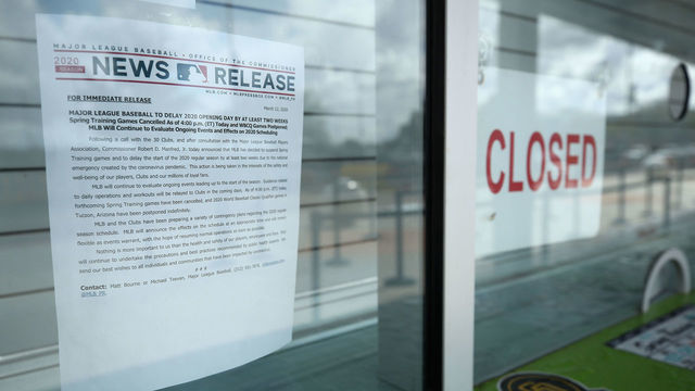 PEORIA, ARIZONA - MARCH 13: Closed signs and MLB news releases are displayed on box office windows outside of Peoria Stadium, home of the San Diego Padres and Seattle Mariners on March 13, 2020 in Peoria, Arizona. Major League Baseball cancelled spring training games and has delayed opening day by at least two weeks due to COVID-19.