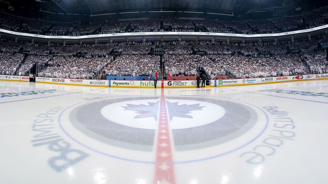 WINNIPEG, MB - APRIL 11: A general view of centre ice prior to NHL action between the Winnipeg Jets and the Minnesota Wild in Game One of the Western Conference First Round during the 2018 NHL Stanley Cup Playoffs at the Bell MTS Place on April 11, 2018 in Winnipeg, Manitoba, Canada.