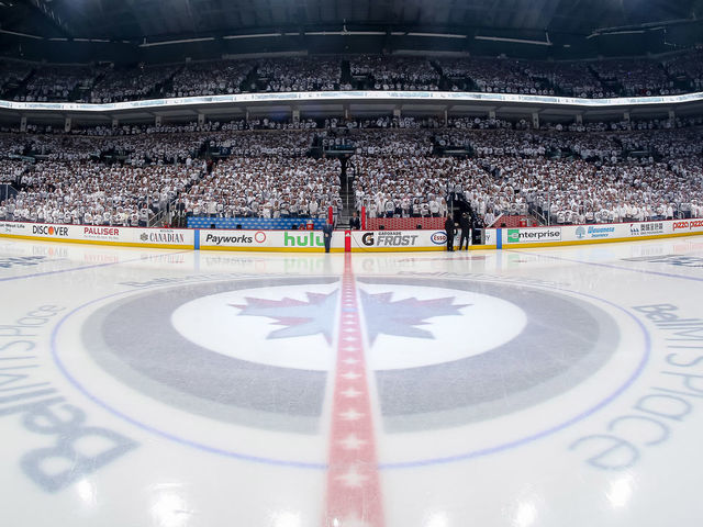 WINNIPEG, MB - APRIL 11: A general view of centre ice prior to NHL action between the Winnipeg Jets and the Minnesota Wild in Game One of the Western Conference First Round during the 2018 NHL Stanley Cup Playoffs at the Bell MTS Place on April 11, 2018 in Winnipeg, Manitoba, Canada.