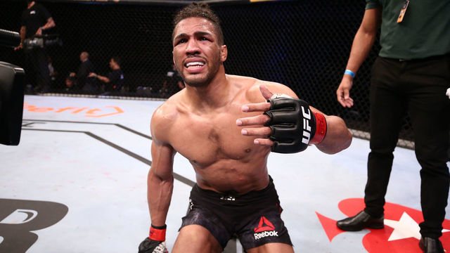 BRASILIA, BRAZIL - MARCH 14: Kevin Lee reacts after his submission loss to Charles Oliveira of Brazil in their lightweight fight during the UFC Fight Night event on March 14, 2020 in Brasilia, Brazil.