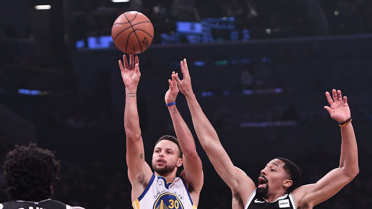 NEW YORK, NY - OCTOBER 28: Stephen Curry #30 of the Golden State Warriors shoots the ball against Spencer Dinwiddie #8 of the Brooklyn Nets during the game at Barclays Center on October 28, 2018 in the Brooklyn borough of New York City.