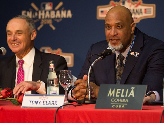 Image: https://assets-cms.thescore.com/uploads/image/file/397792/w640xh480_GettyImages-516841050.jpg?ts=1584381711 HAVANA - MARCH 21 Major League Baseball Commissioner Robert D Manfred Jr and Major League Baseball Players Association Executive Director Tony Clark are seen during a press conference on Monday March 21 2016 at Melia Cohiba Hotel in Havana Cuba