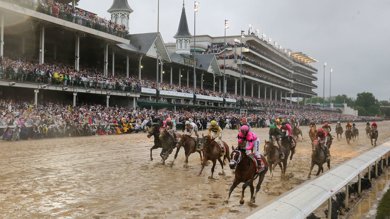 LOUISVILLE, KY - MAY 04: Riders cross the finish line at the 145th running of the Kentucky Derby at Churchill Downs on May 4th, 2019 in Louisville, Kentucky.