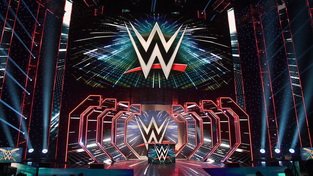 LAS VEGAS, NEVADA - OCTOBER 11: WWE logos are shown on screens before a WWE news conference at T-Mobile Arena on October 11, 2019 in Las Vegas, Nevada. It was announced that WWE wrestler Braun Strowman will face heavyweight boxer Tyson Fury and WWE champion Brock Lesnar will take on former UFC heavyweight champion Cain Velasquez at the WWE's Crown Jewel event at Fahd International Stadium in Riyadh, Saudi Arabia on October 31.