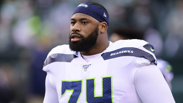 PHILADELPHIA, PENNSYLVANIA - JANUARY 05: George Fant #74 of the Seattle Seahawks warms up prior to the NFC Wild Card Playoff game against the Philadelphia Eagles at Lincoln Financial Field on January 05, 2020 in Philadelphia, Pennsylvania.