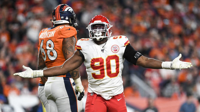 DENVER, CO - OCTOBER 17: Emmanuel Ogbah (90) of the Kansas City Chiefs celebrates swatting a pass down at the line thrown by Joe Flacco (5) of the Denver Broncos during the third quarter on Thursday, October 17, 2019.
