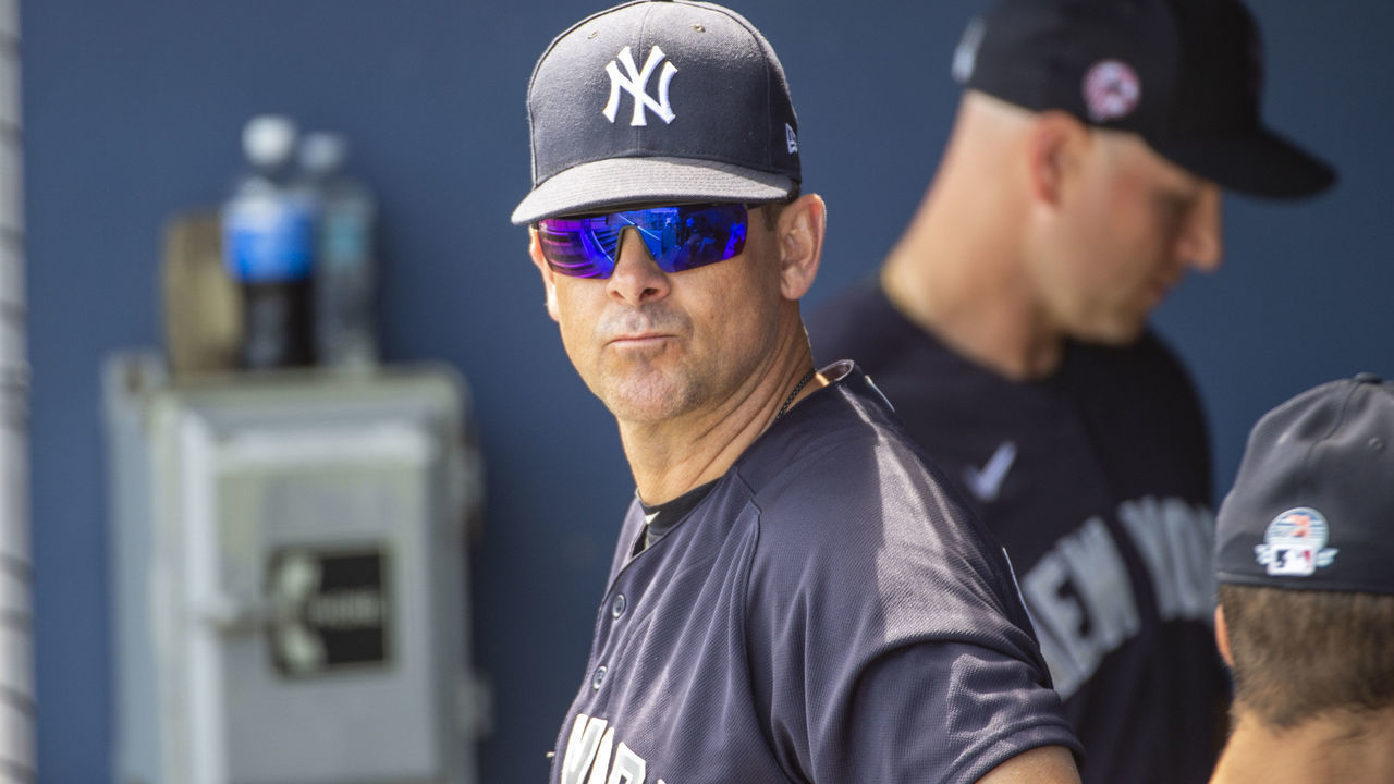 WEST PALM BEACH, FL - MARCH 12: New York Yankees Manager Aaron Boone (17) in the dugout during an MLB spring training game between the New York Yankees and the Washington Nationals at The FITTEAM Ballpark of the Palm Beaches in West Palm Beach, Florida on March 12, 2020. Following this game, Major League Baseball suspended spring training games in response to the coronavirus pandemic.