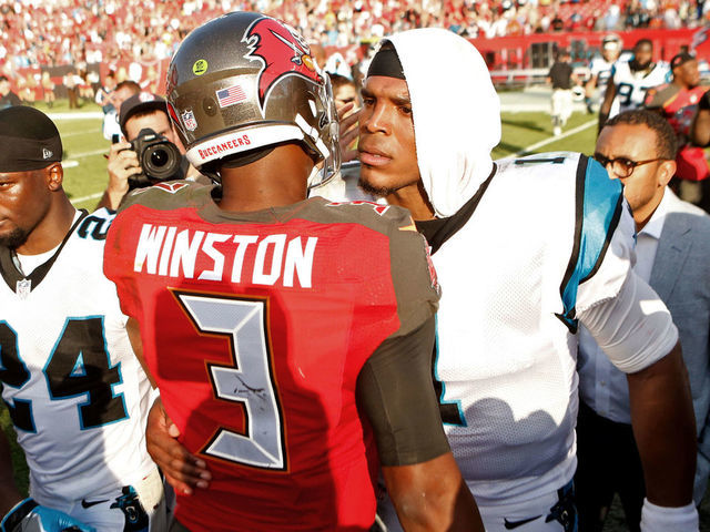 TAMPA, FL - JANUARY 1: Quarterback Jameis Winston #3 of the Tampa Bay Buccaneers speaks with quarterback Cam Newton #1 of the Carolina Panthers following the Buccaneers' 17-16 win over the Panthers at an NFL game on January 1, 2017 at Raymond James Stadium in Tampa, Florida.