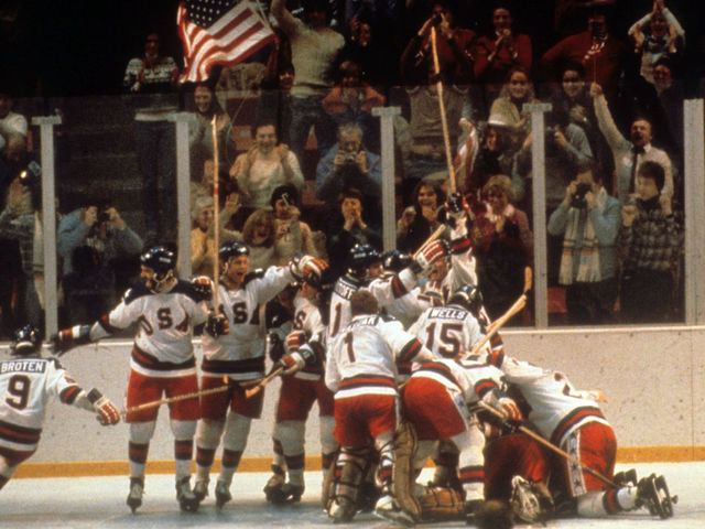 LAKE PLACID, NY - FEBRUARY 22: Team USA celebrates after defeating the Soviet Union to advance to the Gold Medal game during the 1980 Olympic Games on February 22, 1980 at the Olympic Center in Lake Placid, New York.