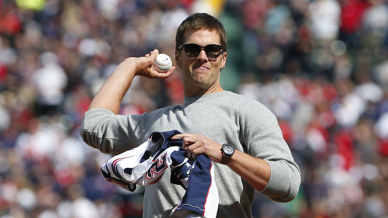 BOSTON - APRIL 3: New England Patriots quarterback Tom Brady throws out the first pitch before the start of the game on Opening Day at Fenway Park in Boston on Apr. 3, 2017.