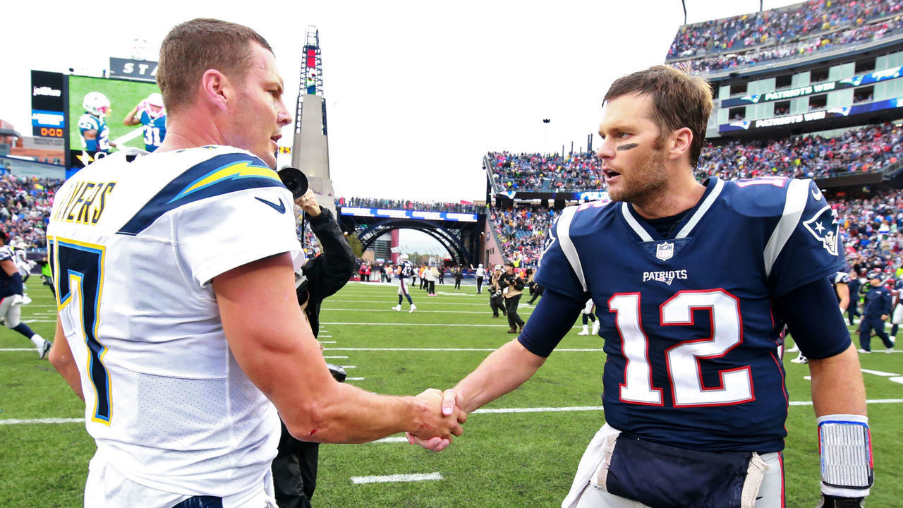 FOXBOROUGH, MA - OCTOBER 29: New England Patriots quarterback Tom Brady shakes hands with Los Angeles Chargers Philip Rivers after they defeated the Chargers 21-13 at Gillette Stadium in Foxborough, Mass., on Oct. 29, 2017.