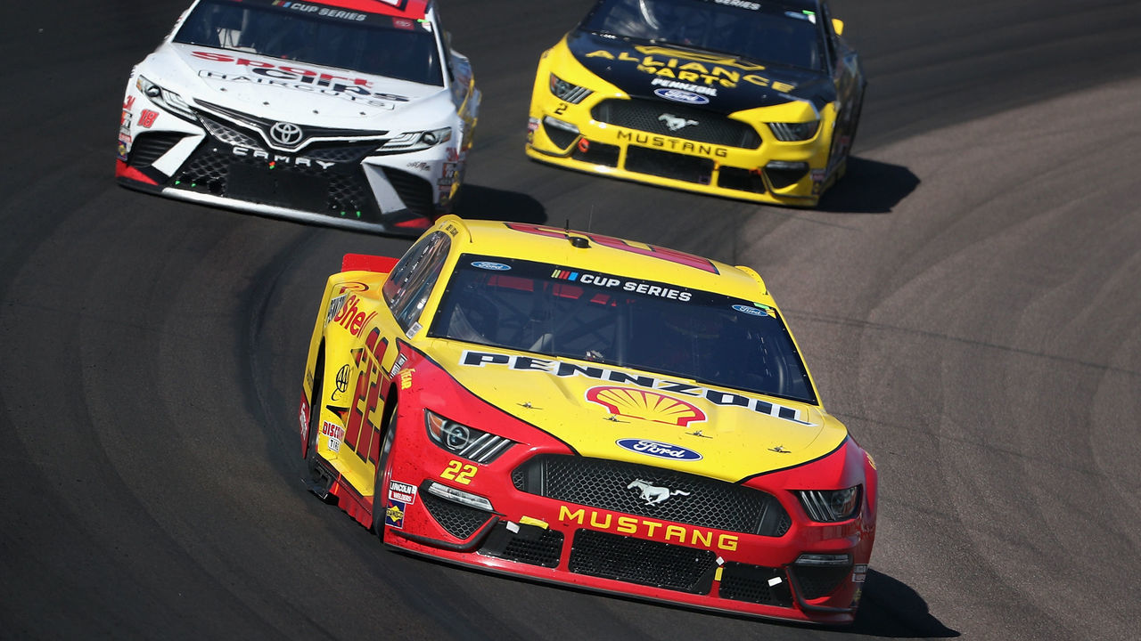 AVONDALE, ARIZONA - MARCH 08: Joey Logano, driver of the #22 Shell Pennzoil Ford, leads Kyle Busch, driver of the #18 Sport Clips Toyota, and Brad Keselowski, driver of the #2 Alliance Parts Ford, and during the NASCAR Cup Series FanShield 500 at Phoenix Raceway on March 08, 2020 in Avondale, Arizona.