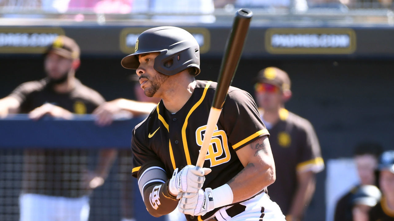 PEORIA, ARIZONA - MARCH 04: Tommy Pham #28 of the San Diego Padres follows through on a swing against the Kansas City Royals during a spring training game on March 04, 2020 in Peoria, Arizona.