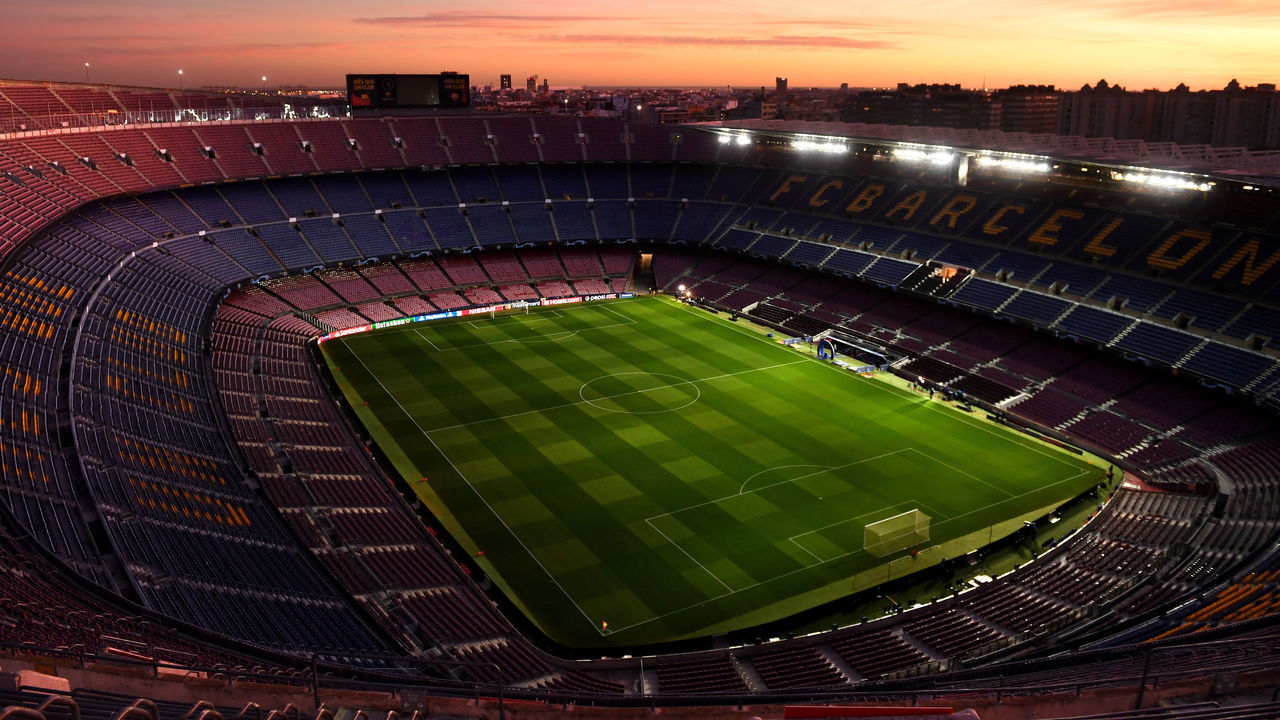BARCELONA, SPAIN - NOVEMBER 27: General view inside the stadium as the sun sets ahead of the UEFA Champions League group F match between FC Barcelona and Borussia Dortmund at Camp Nou on November 27, 2019 in Barcelona, Spain.