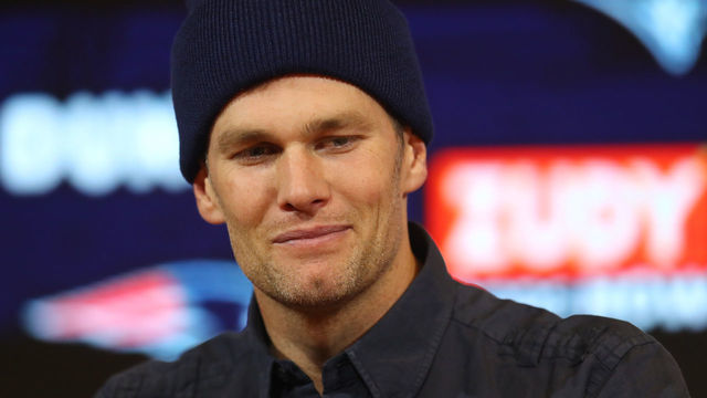 FOXBOROUGH, MASSACHUSETTS - JANUARY 04: Tom Brady #12 of the New England Patriots talks with the media during a press conference after the AFC Wild Card Playoff game against the Tennessee Titans at Gillette Stadium on January 04, 2020 in Foxborough, Massachusetts.