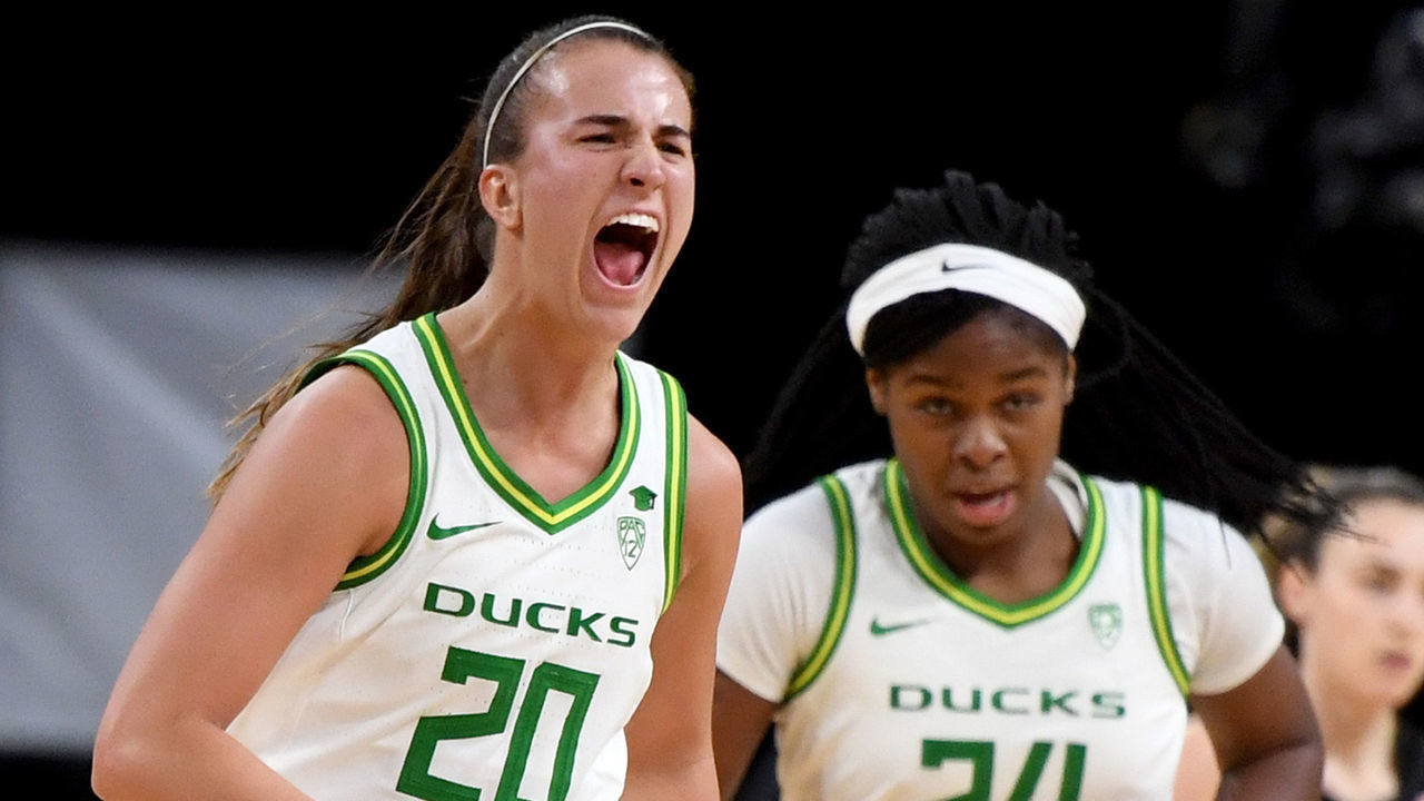 LAS VEGAS, NEVADA - MARCH 06: Sabrina Ionescu #20 and Ruthy Hebard #24 of the Oregon Ducks run off the court after the Utah Utes called a timeout during the Pac-12 Conference women’s basketball tournament quarterfinals at the Mandalay Bay Events Center on March 6, 2020 in Las Vegas, Nevada.