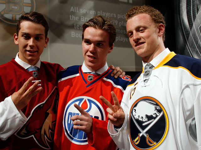 SUNRISE, FL - JUNE 26: First pick Connor McDavid (C) of the Edmonton Oilers, second pick Jack Eichel (R) of the Buffalo Sabres and third pick Dylan Strome (L) of the Arizona Coyotes poses during the first round of the 2015 NHL Draft at BB&T Center on June 26, 2015 in Sunrise, Florida.