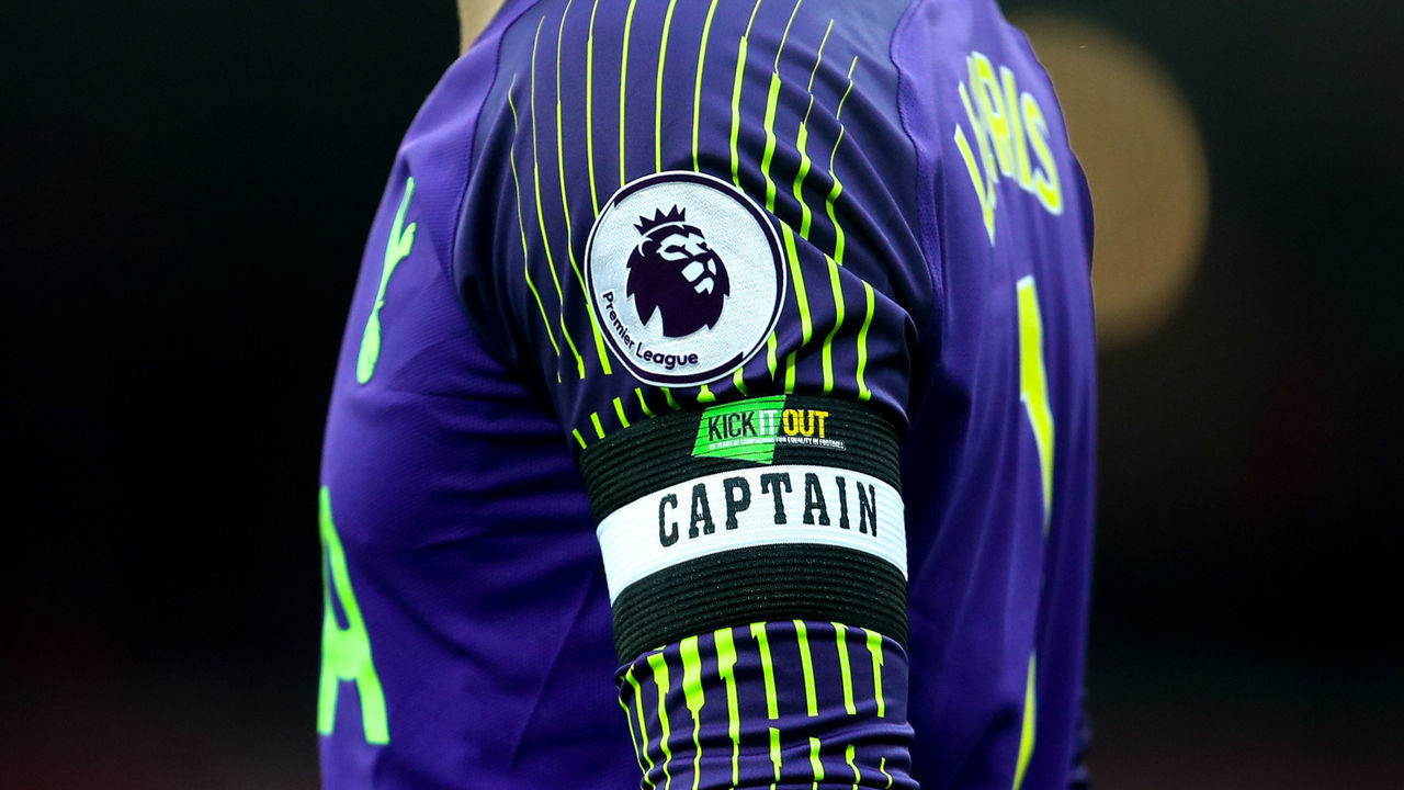 LIVERPOOL, ENGLAND - MARCH 31: A Kick It Out branded captains arm band is seen on the sleeve of Hugo Lloris of Tottenham Hotspur during the Premier League match between Liverpool FC and Tottenham Hotspur at Anfield on March 31, 2019 in Liverpool, United Kingdom.
