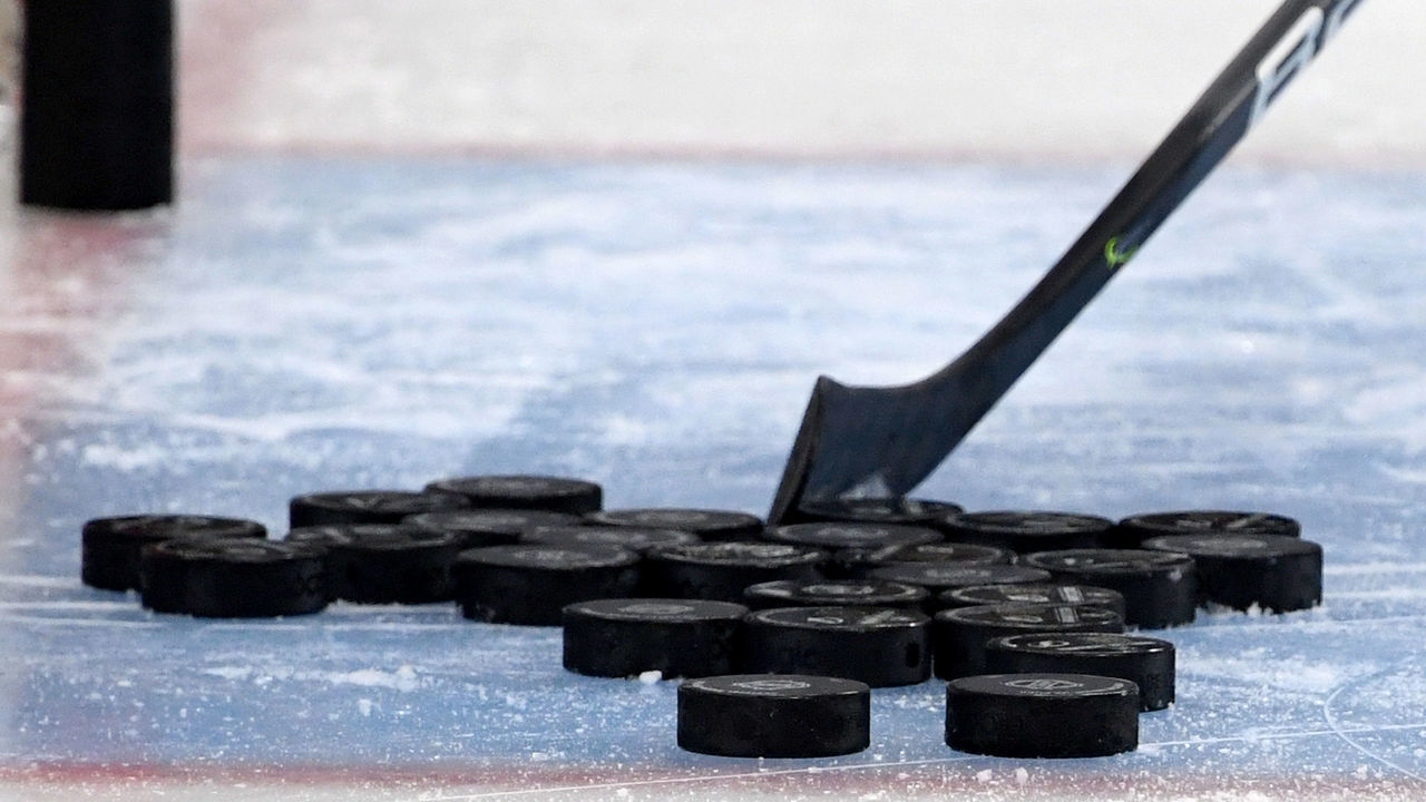 LAS VEGAS, NEVADA - FEBRUARY 20: Hockey pucks are gathered in the crease during warmups before a game between the Tampa Bay Lightning and the Vegas Golden Knights at T-Mobile Arena on February 20, 2020 in Las Vegas, Nevada. The Golden Knights defeated the Lightning 5-3.