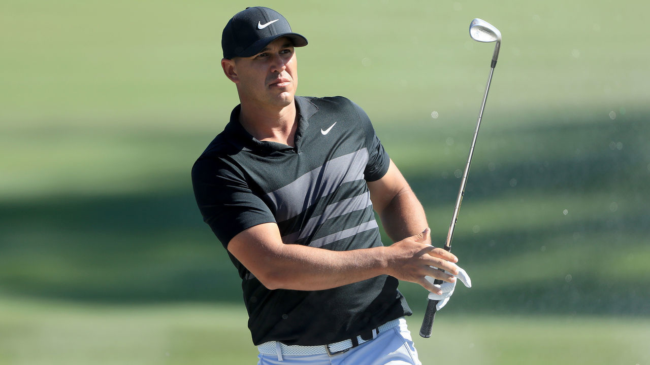 PONTE VEDRA BEACH, FLORIDA - MARCH 12: Brooks Koepka plays a shot on the ninth hole during the first round of The PLAYERS at the TPC Stadium course on March 12, 2020 in Ponte Vedra Beach, Florida.